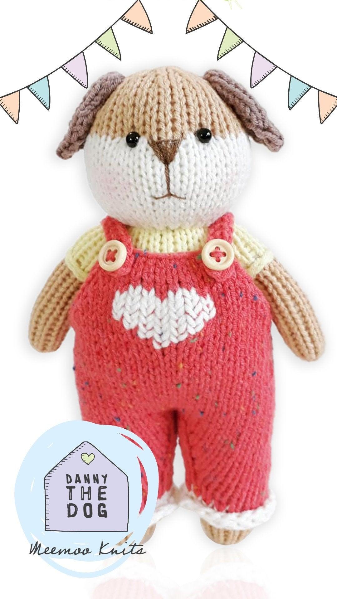 a teddy bear with a red bow on its head