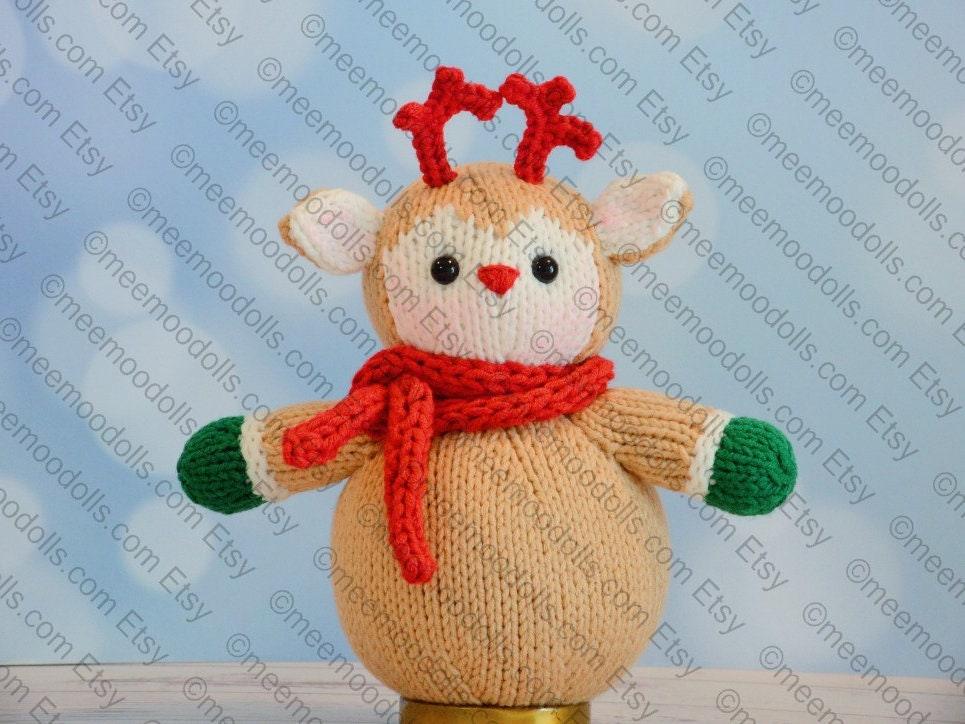 a teddy bear with a red bow on its head