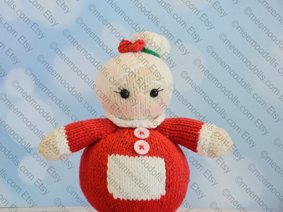 a teddy bear wearing a red bow tie