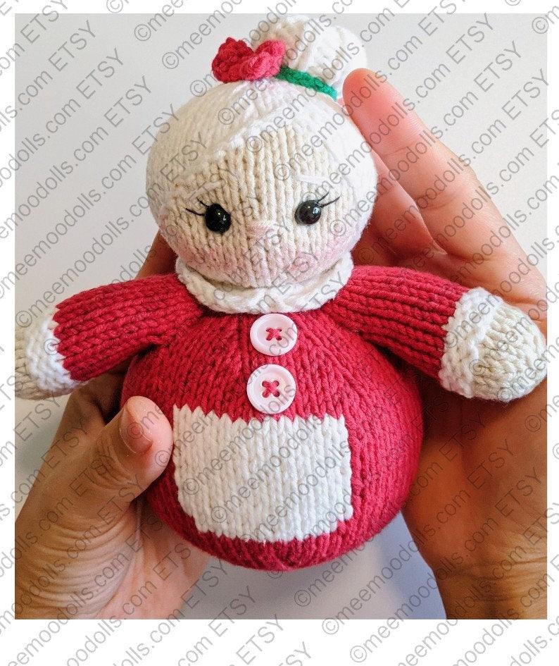 a close up of a person holding a teddy bear 